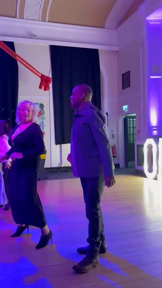 Mike Lawrence dancing and enjoying music with friends