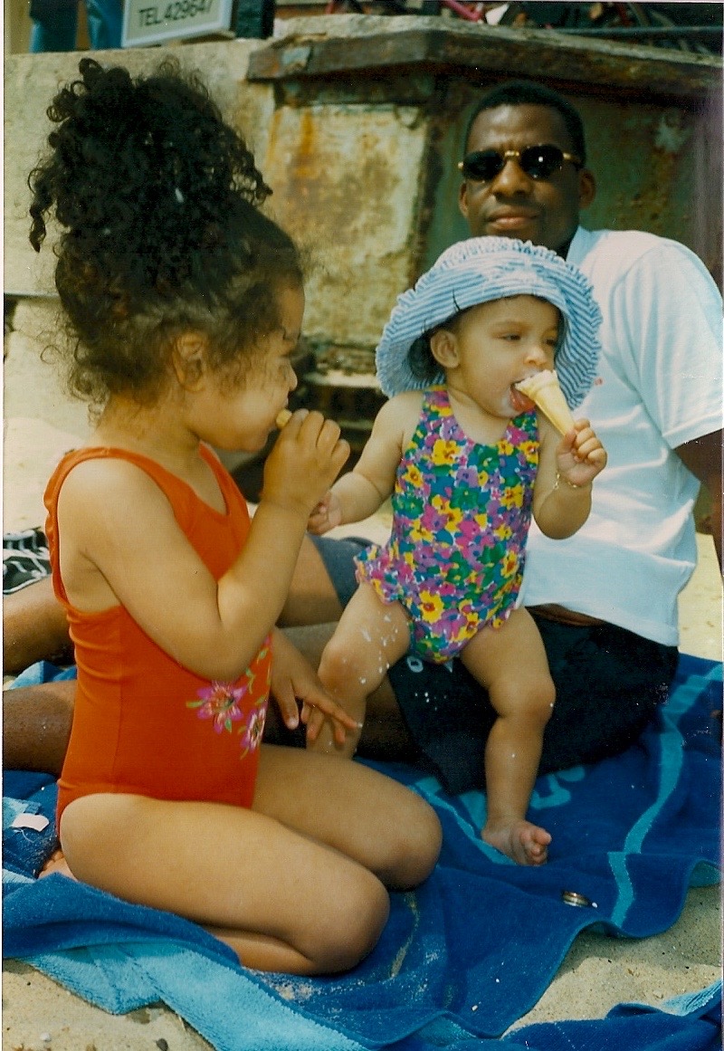 Mike Lawrence with his daughters Jourdan and Tia during their early childhood