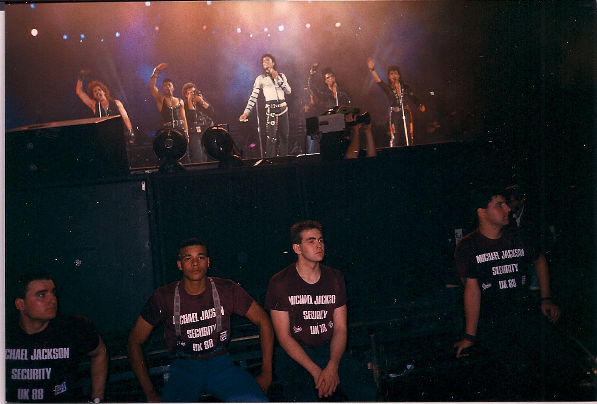 Michael Jackson performing at Wembley Stadium during the Bad World Tour, attended by Mike Lawrence